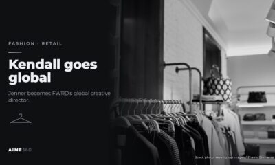 Clothes on racks in a boutique, in black and white, beside the headline Kendall goes global