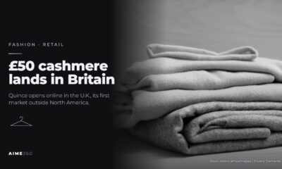 A stack of folded knit sweaters, in black and white, beside the headline £50 cashmere lands in Britain